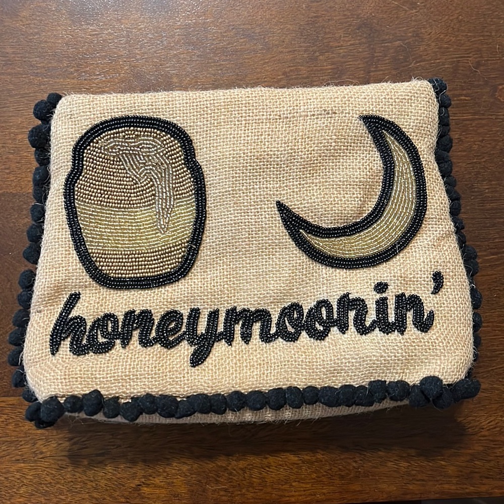 Island to east side honeymoon clutch